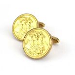 A pair of 9ct yellow gold cufflink's each set a sovereign dated 1965 and 1968, overall 26.