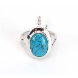 An 18ct white gold ring set oval cabochon turquoise, ring size R, 6.