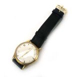 A gentleman's 9ct yellow gold manual wind wristwatch by Omega,