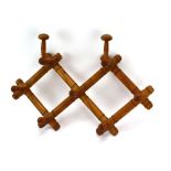 A French faux bamboo concertina hat and coat rack
