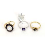 Three 9ct yellow and white gold dress rings set blue coloured stones, various sizes, overall 7.