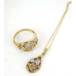 A 9ct yellow gold dress ring set small diamonds in a pierced foliate setting, ring size T 1/2,