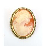 A 9ct yellow gold brooch set oval cameo depicting a classical female figure, l.