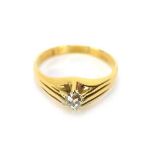 A yellow metal ring set old cut diamond in an eight claw setting, stone approximately 0.