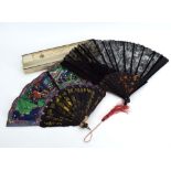 A cased faux-tortoiseshell and black lace fan together with a Japanese fan