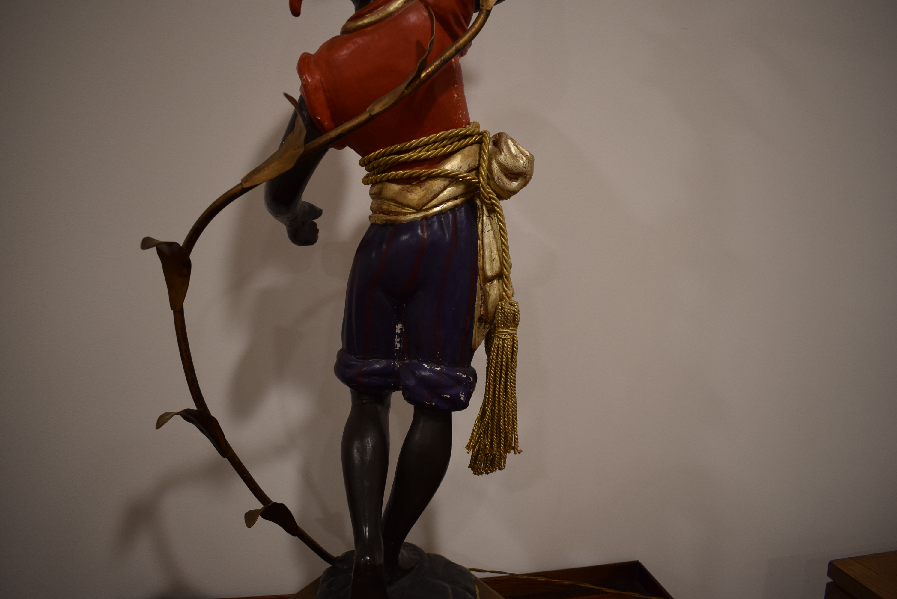 A polychrome and metalwork 'blackamoor' lamp modelled as a young man holding a five-branch foliate - Image 4 of 13