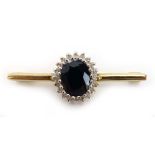 A 9ct yellow gold bar brooch set diamond and sapphire cluster, w. 3.6 cm, 2.