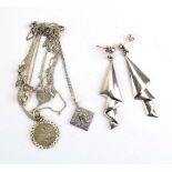 A small parcel of metalware jewellery comprising a pair of ear pendants and five pendant necklaces