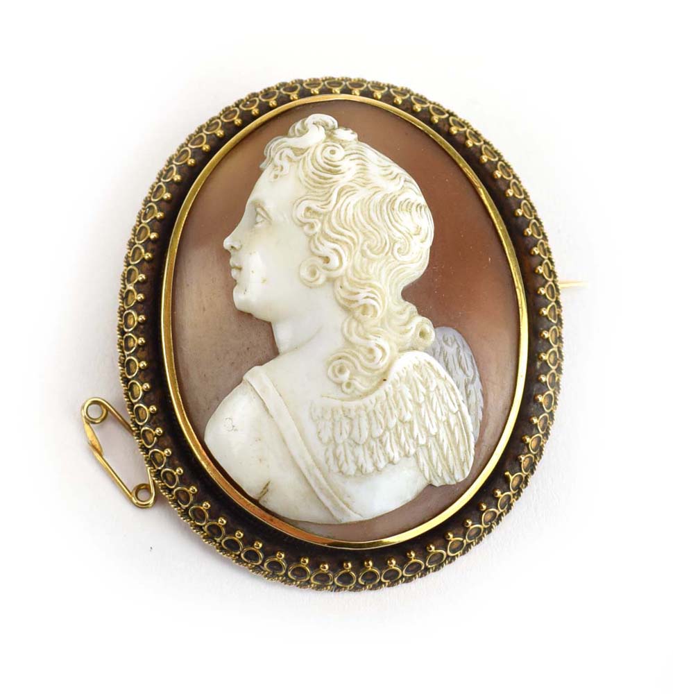 A late 19th/early 20th century yellow metal mounted cameo brooch of oval form carved with a putto, - Image 3 of 4