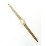 A ladies 9ct yellow gold manual wind wristwatch by Bueche Girod,