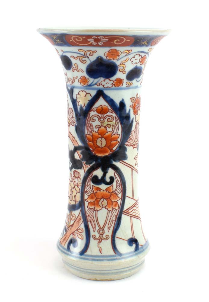 A late 17th/early 18th century Japanese vase of flared cylindrical form decorated with a garden