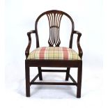 A late 18th century mahogany hoop back elbow chair with a tartan seat