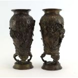 A pair of Japanese brown patinated cast metal vases,