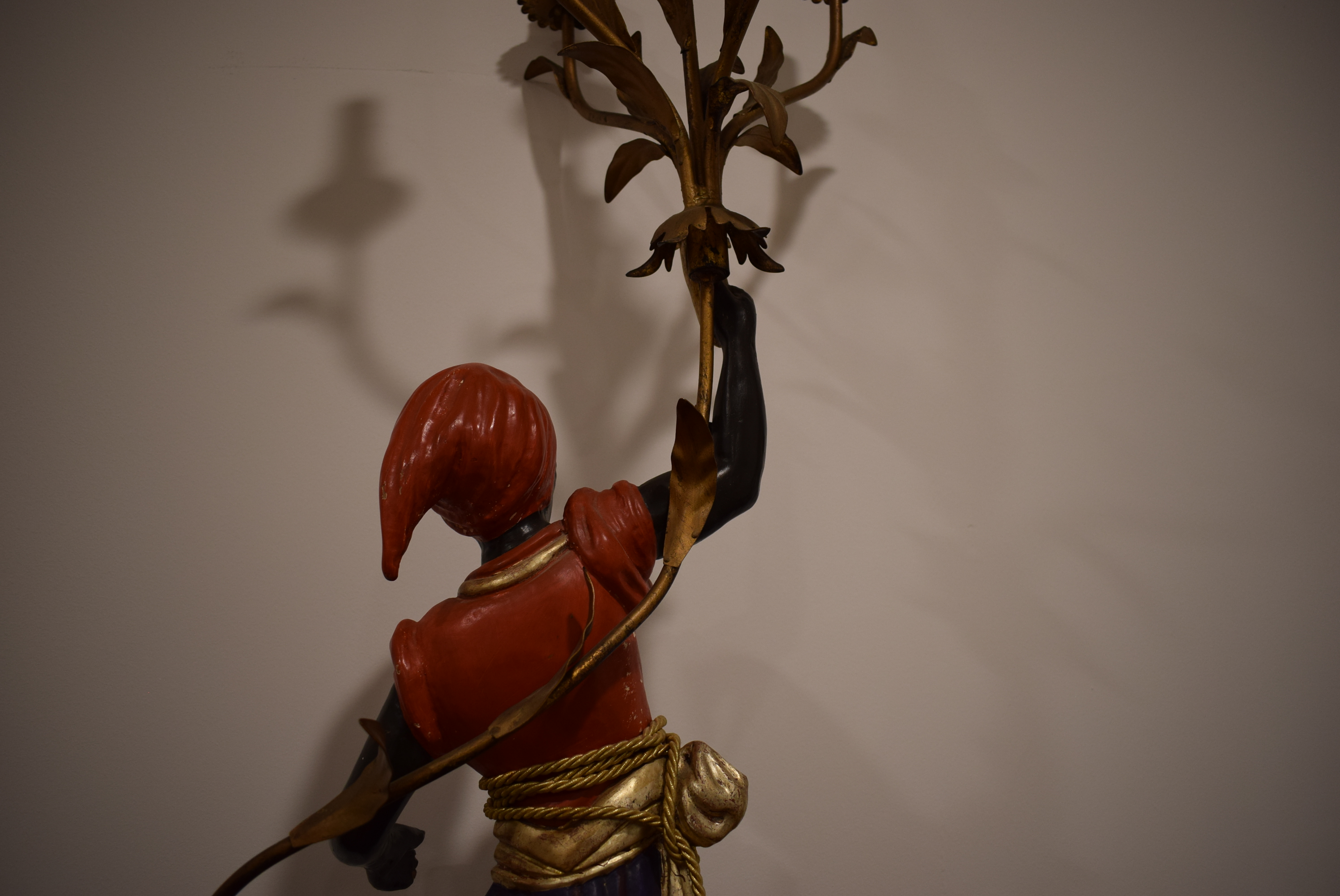 A polychrome and metalwork 'blackamoor' lamp modelled as a young man holding a five-branch foliate - Image 5 of 13