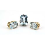 A pair of yellow metal ear studs, each set facet cut pale blue topaz with a clip fitting, l.
