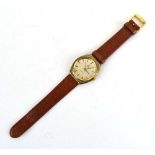 A gentleman's gold plated manual wind wristwatch by Omega,