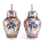 A pair of 19th century Japanese covered vases of baluster form,