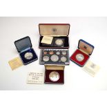 A Royal Mint silver proof crown commemorating the Queen's silver jubilee,