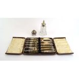 A set of six silver handled fish knives and forks, cased,