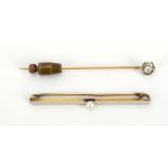 A yellow metal stick pin set small diamond, l. 5.