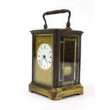 A 19th century French repeater carriage clock, the movement striking on a gong,