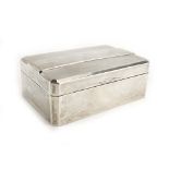 A silver engine turned cigarette box of rectangular form, hallmarks rubbed, w.
