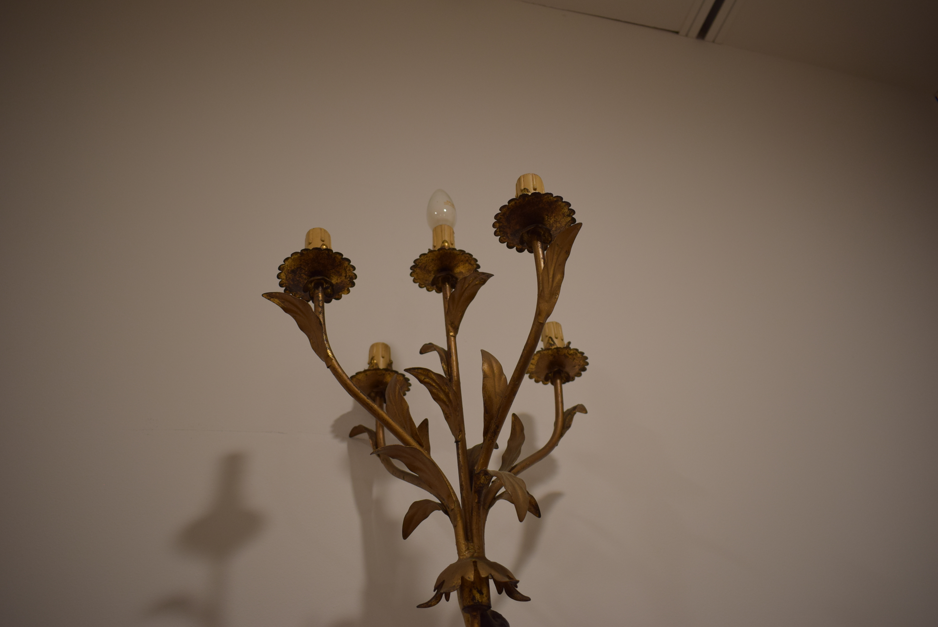 A polychrome and metalwork 'blackamoor' lamp modelled as a young man holding a five-branch foliate - Image 6 of 13