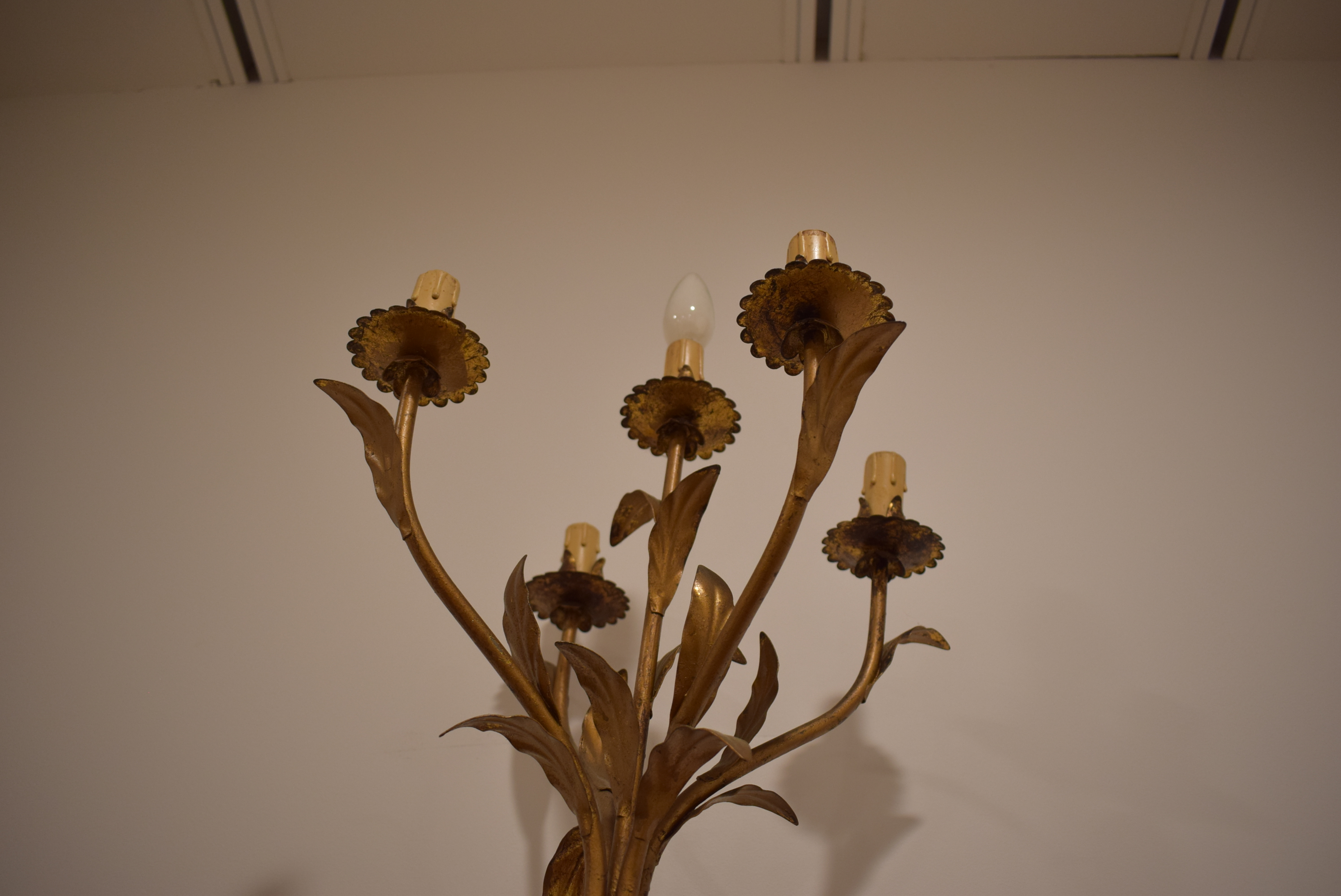 A polychrome and metalwork 'blackamoor' lamp modelled as a young man holding a five-branch foliate - Image 11 of 13