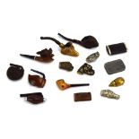 A group of smoking collectable's including briar pipes, snuffs, figural vesta cases etc.