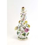 A late 19th century continental porcelain covered vase of slender ovoid form,