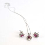 A 9ct white gold finelink necklace suspending a teardrop pendant set ruby and diamonds,