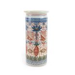 An 18th century Japanese brush pot of cylindrical form decorated in the Imari palette with