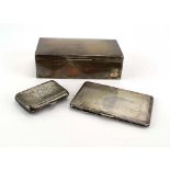 A silver, parcel gilt and engine turned cigarette case of rectangular form,