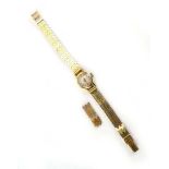 A ladies 18ct yellow gold manual wind wristwatch,