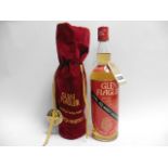 An old bottle of Glen Flagler 8 year old Rare all malt Scotch Whisky with red velvet bag 70proof 26