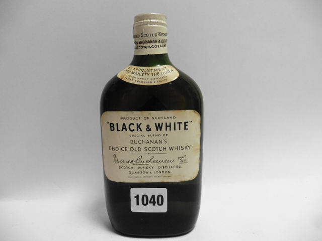 a 1/3 size bottle of Black & White Buchanan's Choice Old Scotch Whisky circa 1950's with spring cap