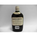 a 1/3 size bottle of Black & White Buchanan's Choice Old Scotch Whisky circa 1950's with spring cap