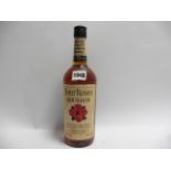 An old bottle of Four Roses Kentucky Straight Bourbon Whiskey aged 6 years 43% 75cl