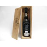 A bottle of Cockburn's 1984 Late Bottled Vintage Port with own wooden box (ullage into neck)