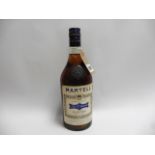 An old bottle of Martell 3 star Cognac circa1970's 24 fl oz 70 proof