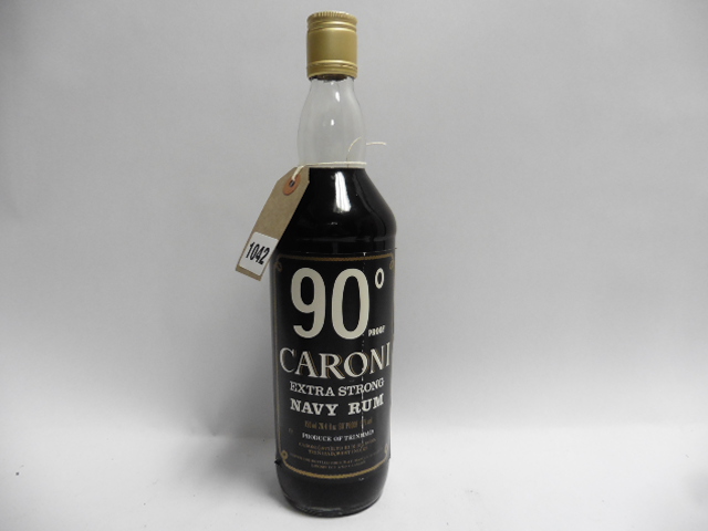 An old bottle of Caroni 90 Proof Extra Strong Navy Rum from Trinidad circa mid 1970's 90 proof 51%