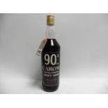 An old bottle of Caroni 90 Proof Extra Strong Navy Rum from Trinidad circa mid 1970's 90 proof 51%