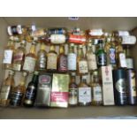 A collection of about 32 Whisky miniatures including Bowmore, Balblair,