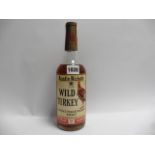 A bottle of Austin Nichols 8 year old Wild Turkey Kentucky Straight Bourbon Whisky circa 1960s/70s