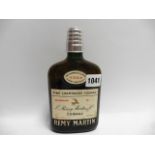 an old 1/3 size bottle of Remy Martin VSOP Fine Champagne Cognac for Swissair circa 1960's no size