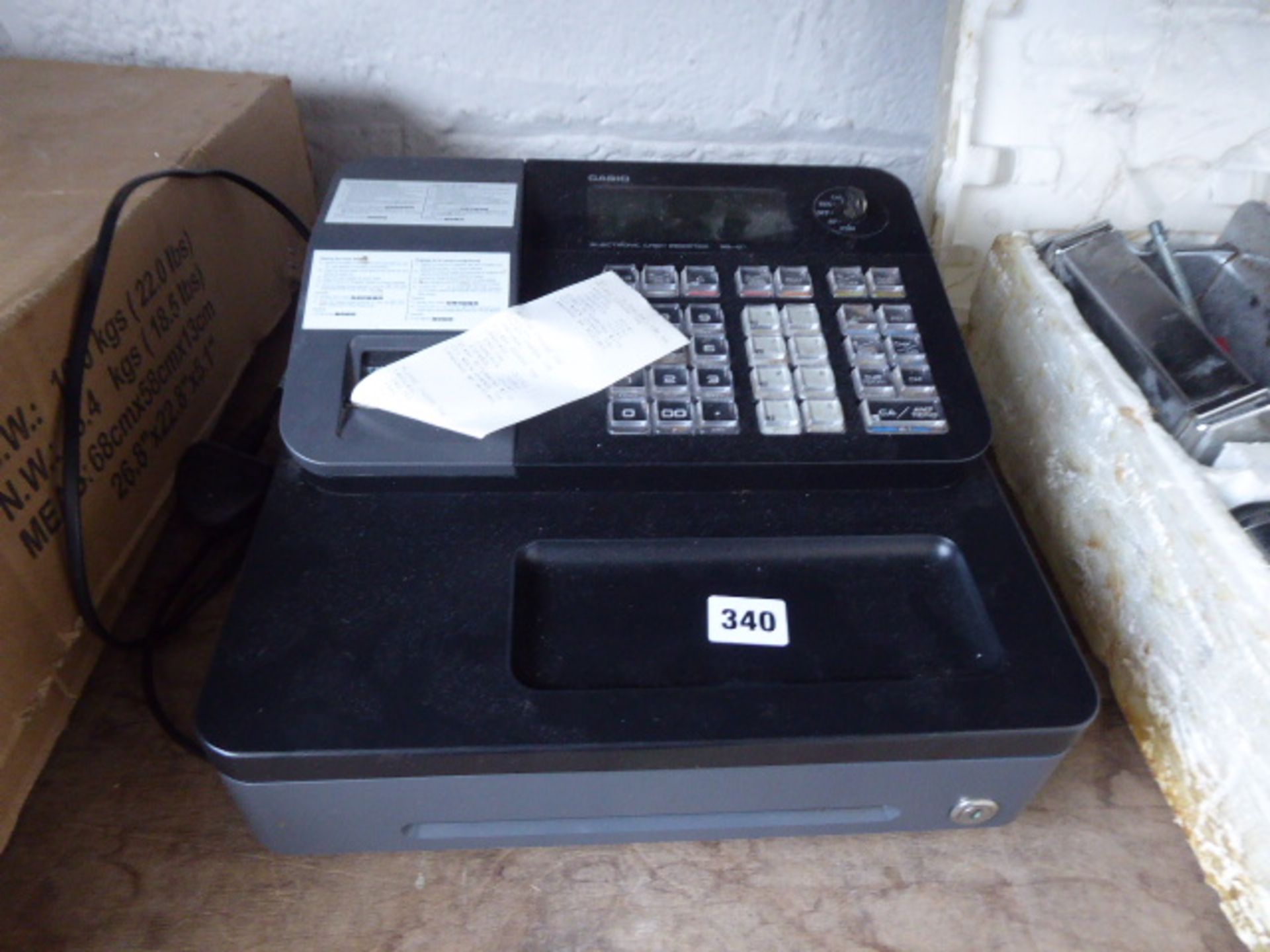 (TN 94) - Casio cash register