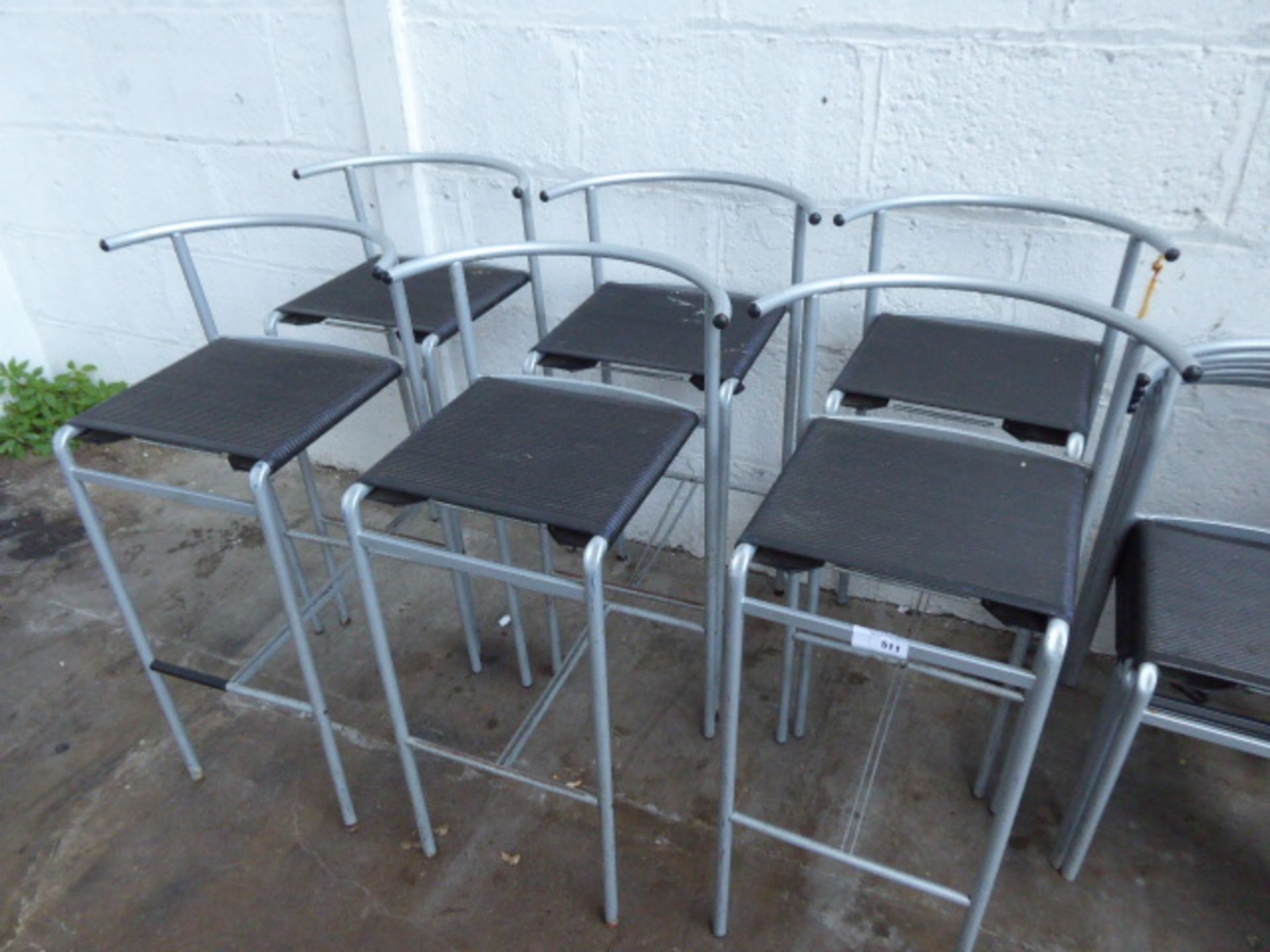 6 Philippe Stark high stools with 11 stacking chairs