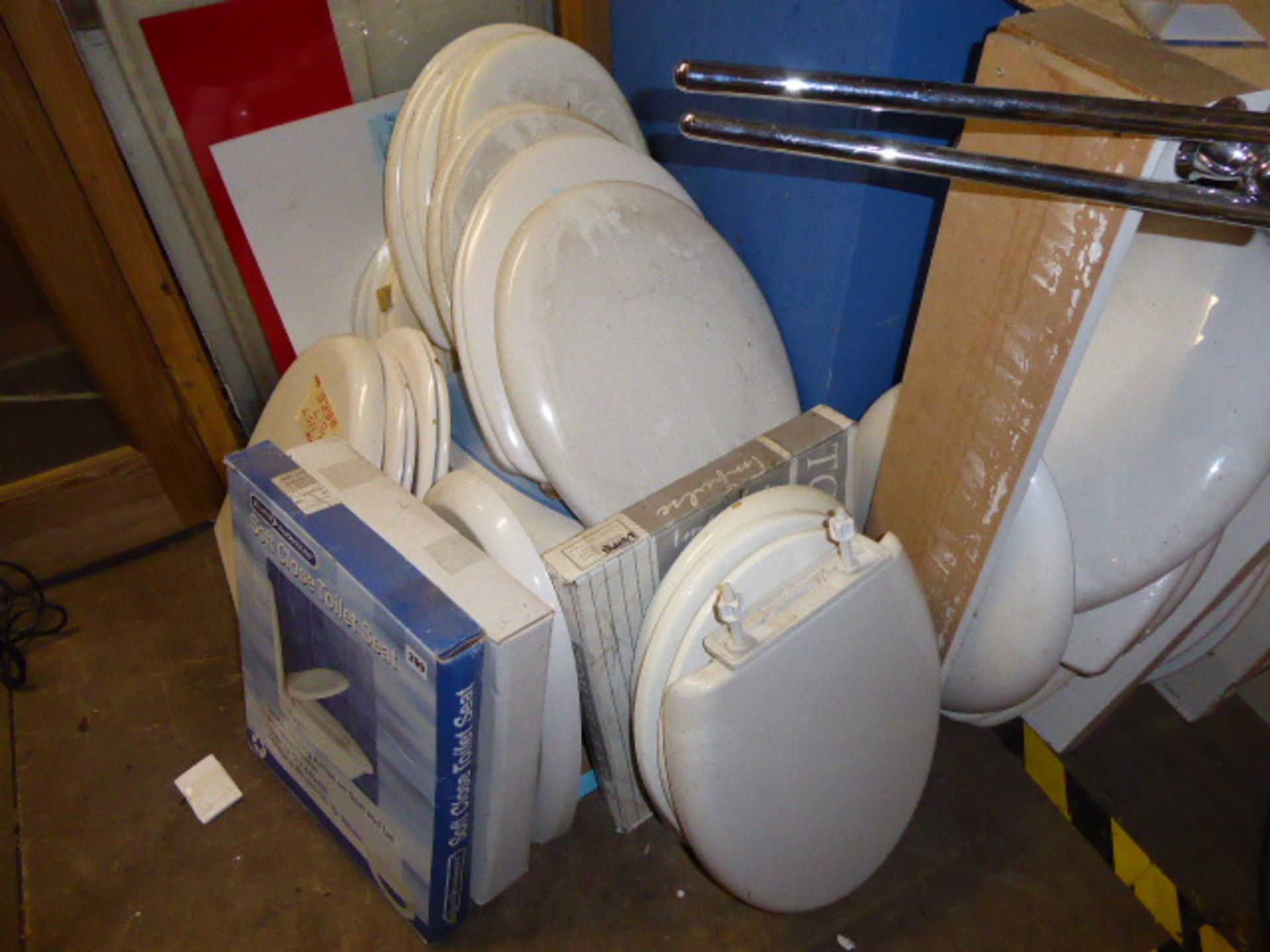 Collection of approximately 25 various toilet seats
