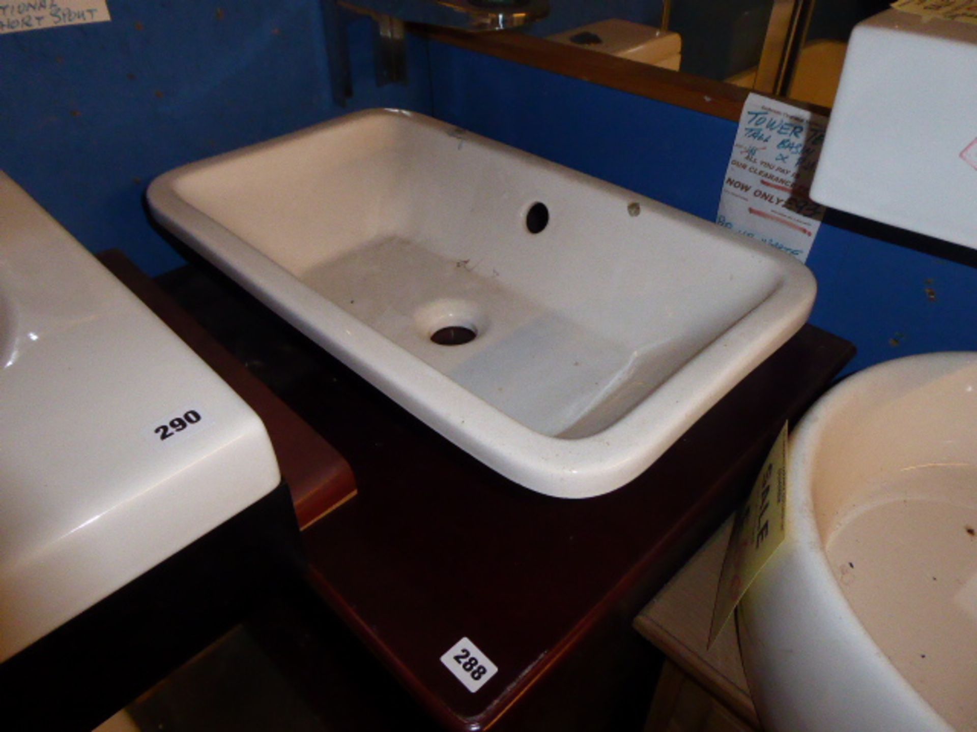 2 circular white ceramic bowls and a small rectangular bowl