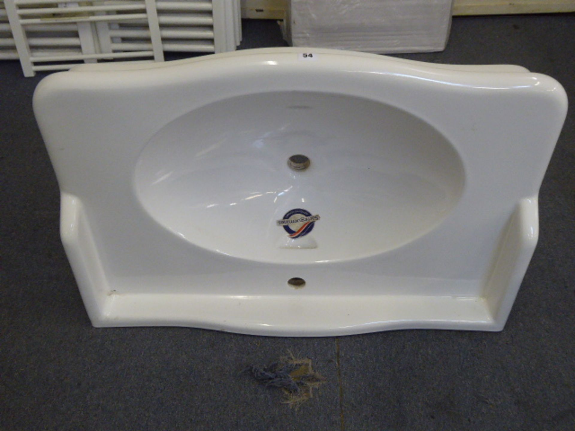 A large white Sarreguemines reproduction wash basin